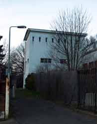 Part of the pool building adjacent to the lane that runs between Broomhill Road and Sherrington Road